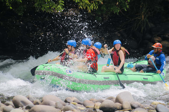A group of students white water rafting in Costa Rica.